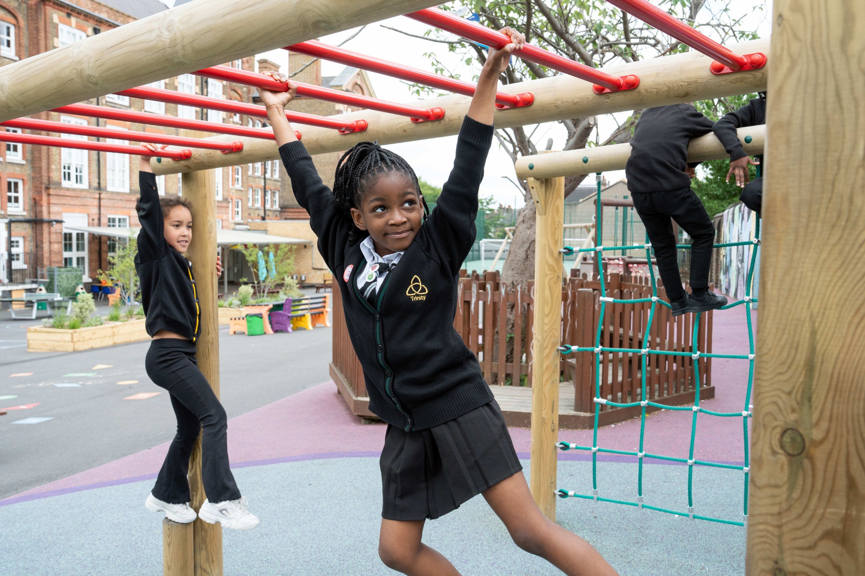 Children learning and exploring in the Early Years at Trinity Primary
